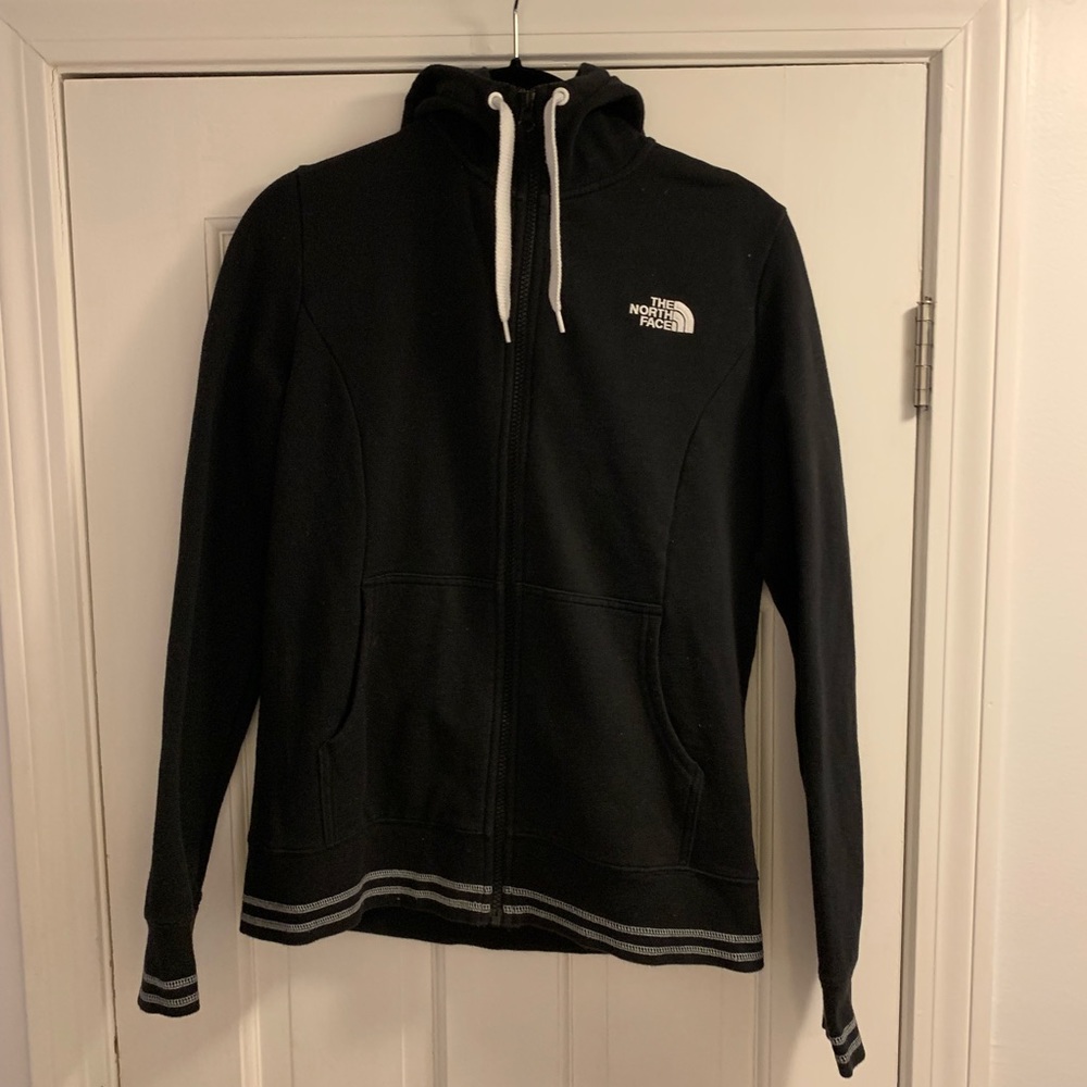 North Face black zip-up hoodie with white detail